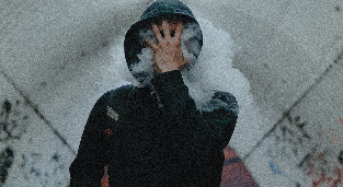 In the smoke of cigarettes
